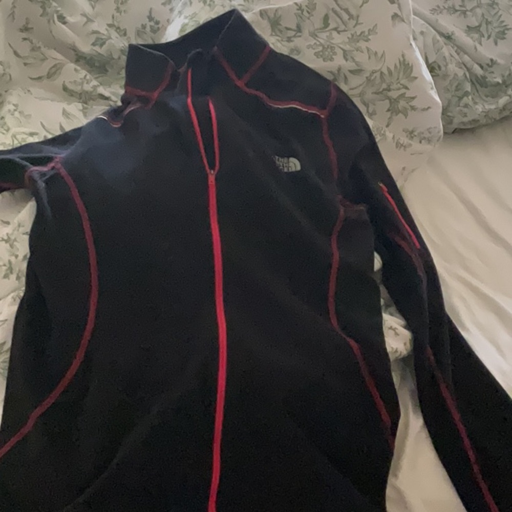 Black Jacket with Red Trim The North Face . Thin fleecy beautiful stitch detail